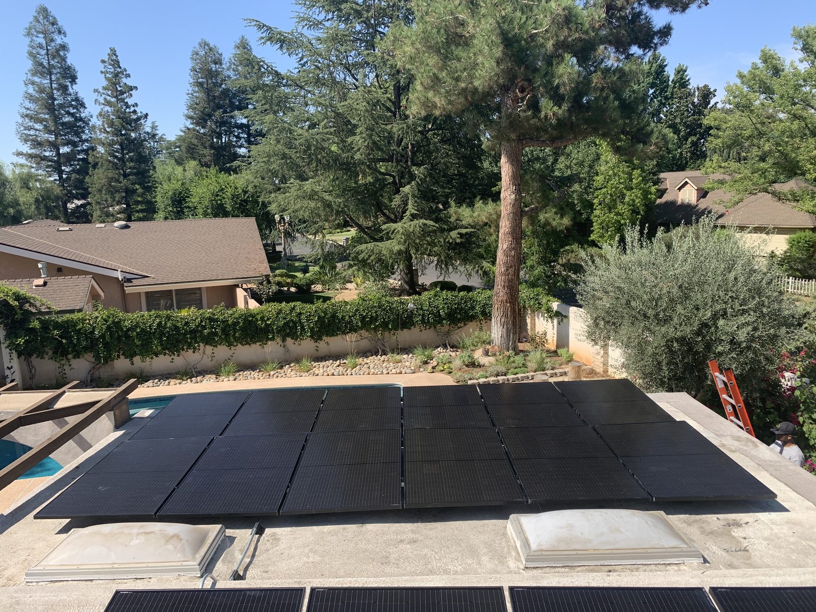 Roof-mounted solar panels from a recent Net Metering Systems Clovis install